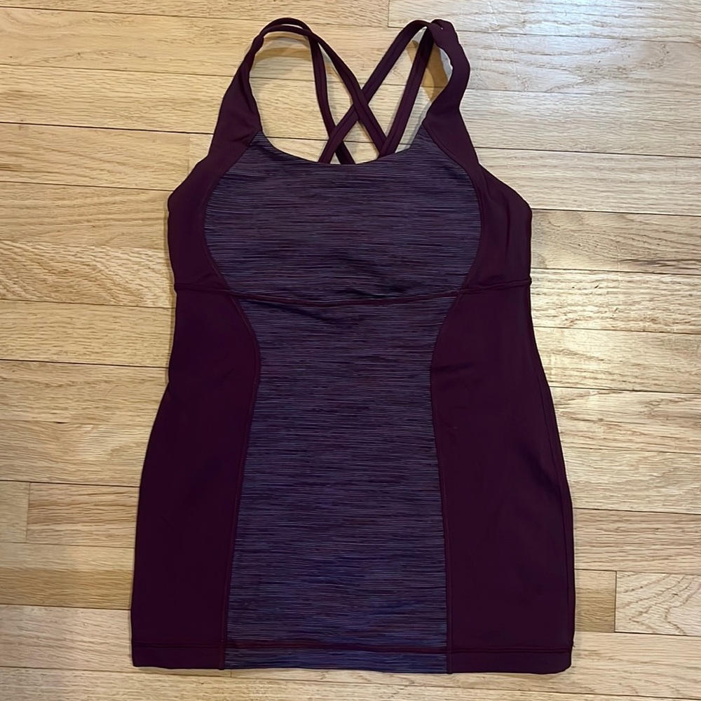 Lululemon workout tank size 6. Purple color with pattern on the front.